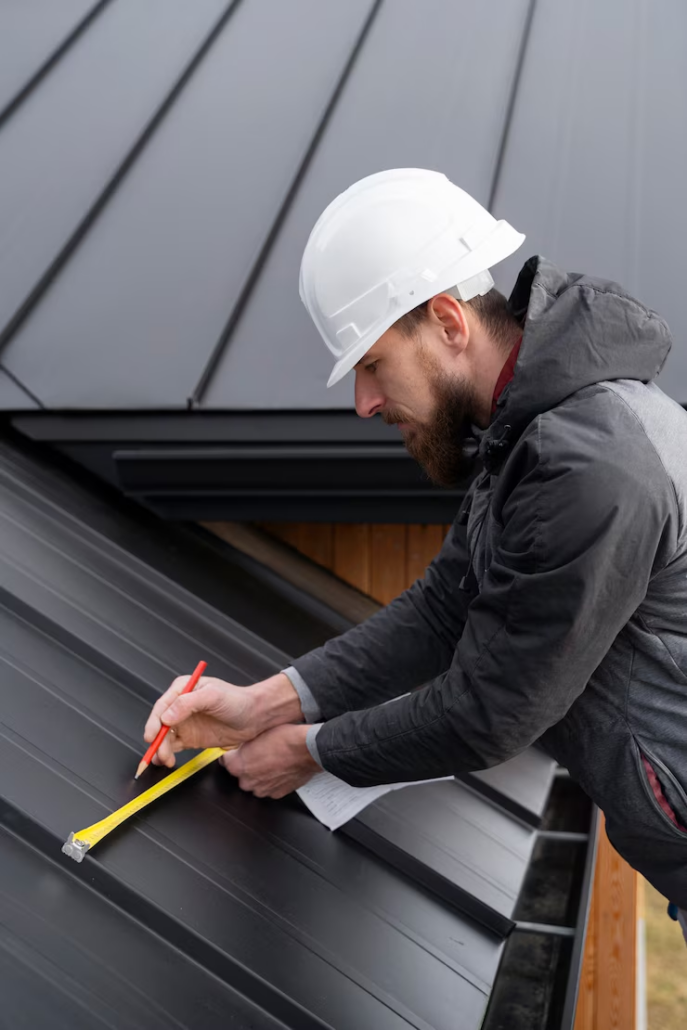A licensed roofer working on the repair of a roof. Get in touch with us today to get your free estimate.
