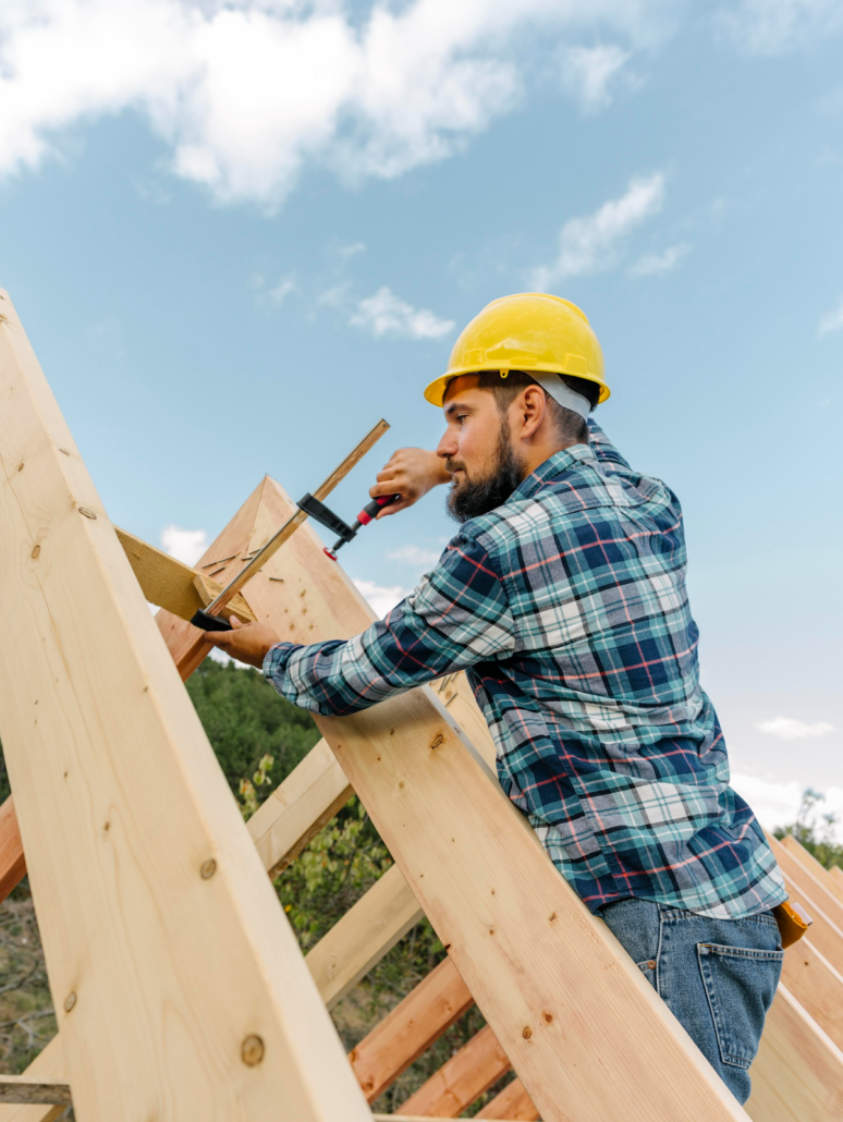 An expert roofer repairing a residential rooftop. Get an estimate today by reaching out to us.