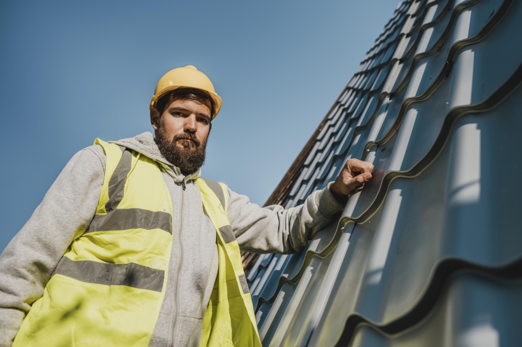 Expert roofers working on the construction of a residential roof. Get in touch with us today to receive your free estimate.
