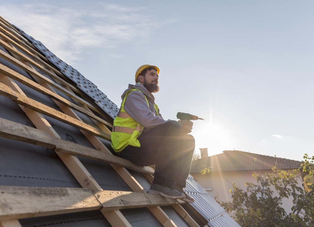 Licensed roofers working on the installation of a roof. Get in touch with us today to get your free estimate.