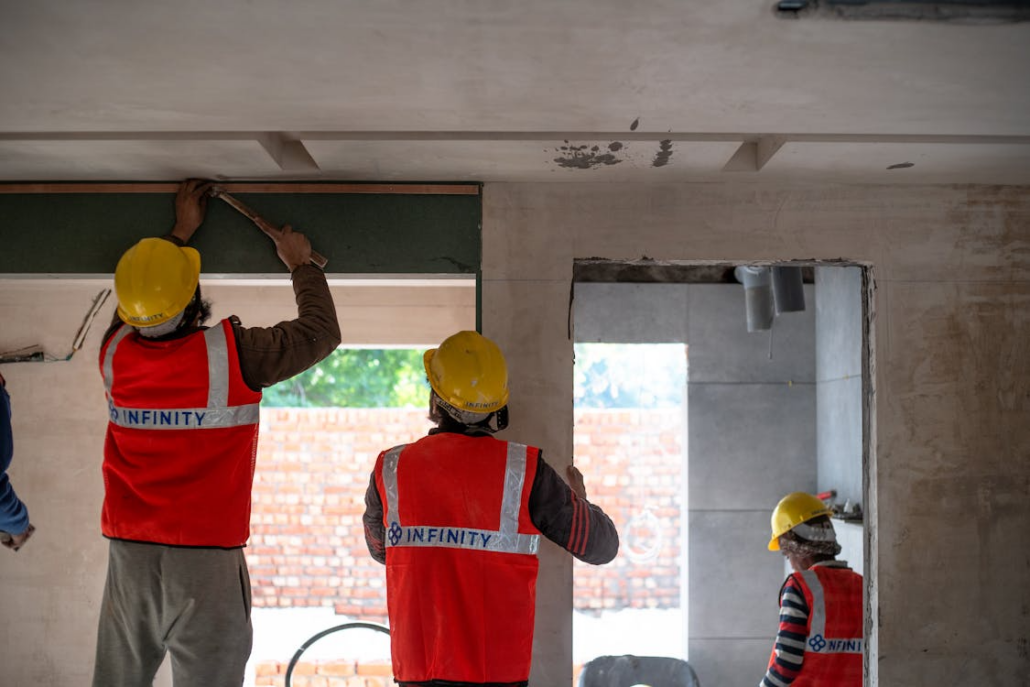 Experiences roofing contractors working on the repair of a residential roof. Get your free estimate today.